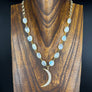 Rainbow moonstone necklace with crescent moon - gold tone