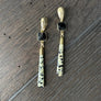 Dalmatian jasper and onyx earring - gold