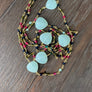 Long beaded gemstone necklace - gold tone
