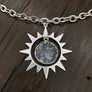 Druzy centered sunburst necklace - antique silver