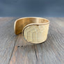 Modern leather cuff bracelet with snakeskin print