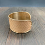 Modern leather cuff bracelet with snakeskin print