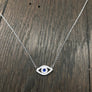 Evil eye protective layering necklace with pavé czs and blue cz eye
