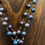 Peacock faux pearl and crystal drop necklace - mixed metal