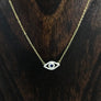 Evil eye protective layering necklace with pavé czs and blue cz eye