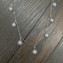 Dangling starburst necklace - silver/white - Renee Piatt Collection