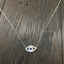 Evil eye protective layering necklace with pavé czs and blue cz eye - Renee Piatt Collection