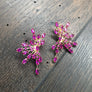 Half starburst button earrings