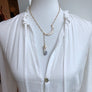 Reversible mother of pearl crescent moon and amethyst slice necklace - gold