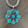 Turquoise flower pendant with 9 stone statement necklace - silver tone