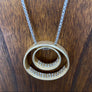Double cz trimmed hoop necklace - mixed metal