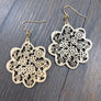 Laser cut wooden filigree flower disc earrings