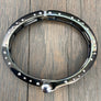Nailhead accent hinged bangle bracelet - gloss black and chrome - Renee Piatt Collection