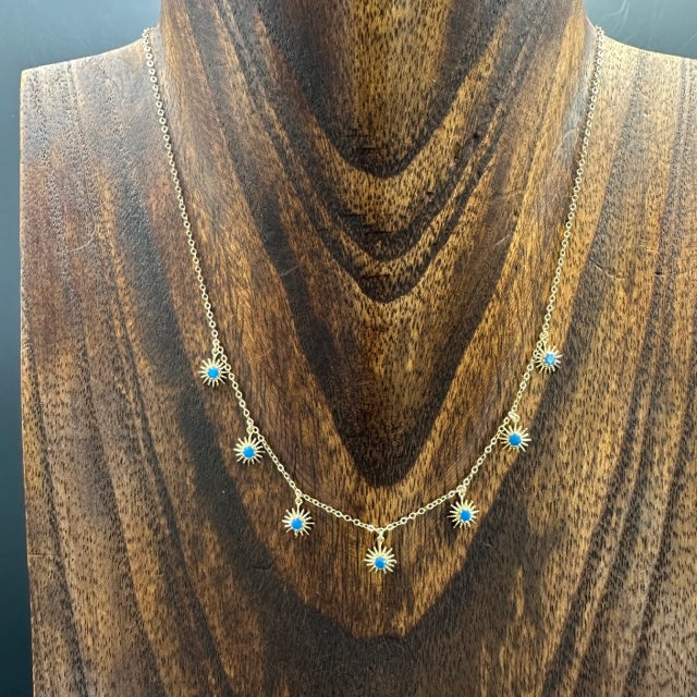 Dangling starburst necklace - gold/blue