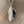 Brown and ivory agate slice on howlite necklace - silver