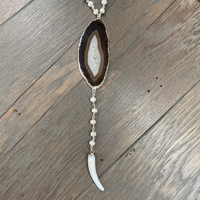 Brown and ivory agate slice necklace with shell horn - silver