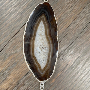 Brown and ivory agate slice necklace with shell horn - silver