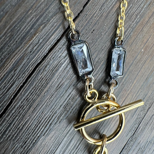 White topaz starburst necklace - gold/oxidized silver