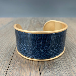Modern leather cuff bracelet with snakeskin print