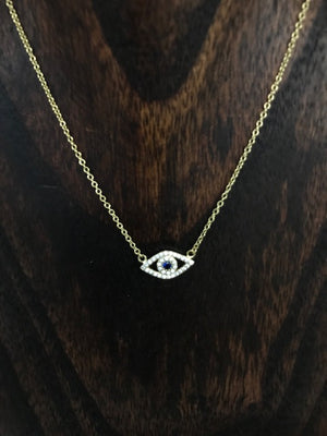 Evil eye protective layering necklace with pavé czs and blue cz eye