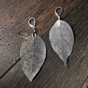 Filigree leaf print earrings - silver and gold