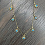 Dangling starburst necklace - gold/blue - Renee Piatt Collection