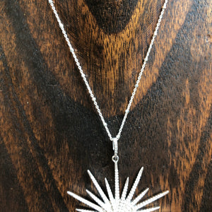 Pavé cz sunburst and tiny star necklace