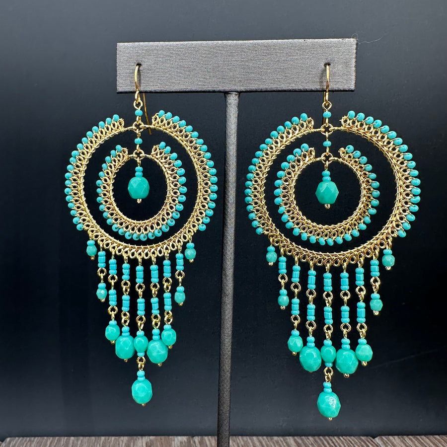 Turquoise toned chandelier earrings - gold tone