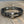 Nailhead accent hinged bangle bracelet - gloss black and chrome